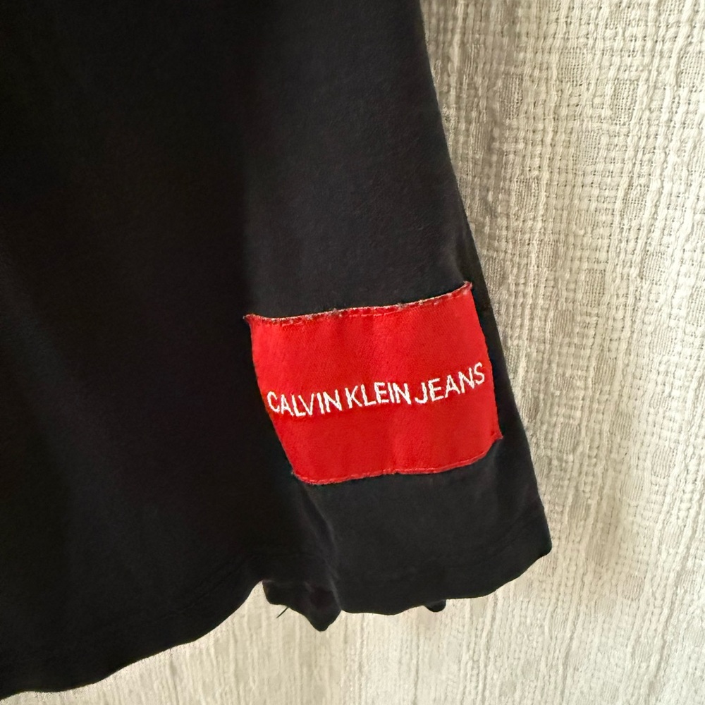 Calvin Klein Jeans Black Tee with Red Patch